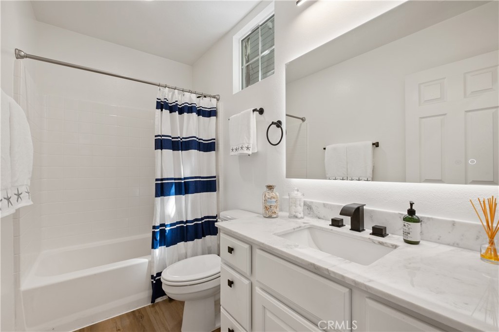 27 Reese Creek Ladera Ranch, CA 92694 - Photo 9 of 40 a bathroom with a sink toilet and shower