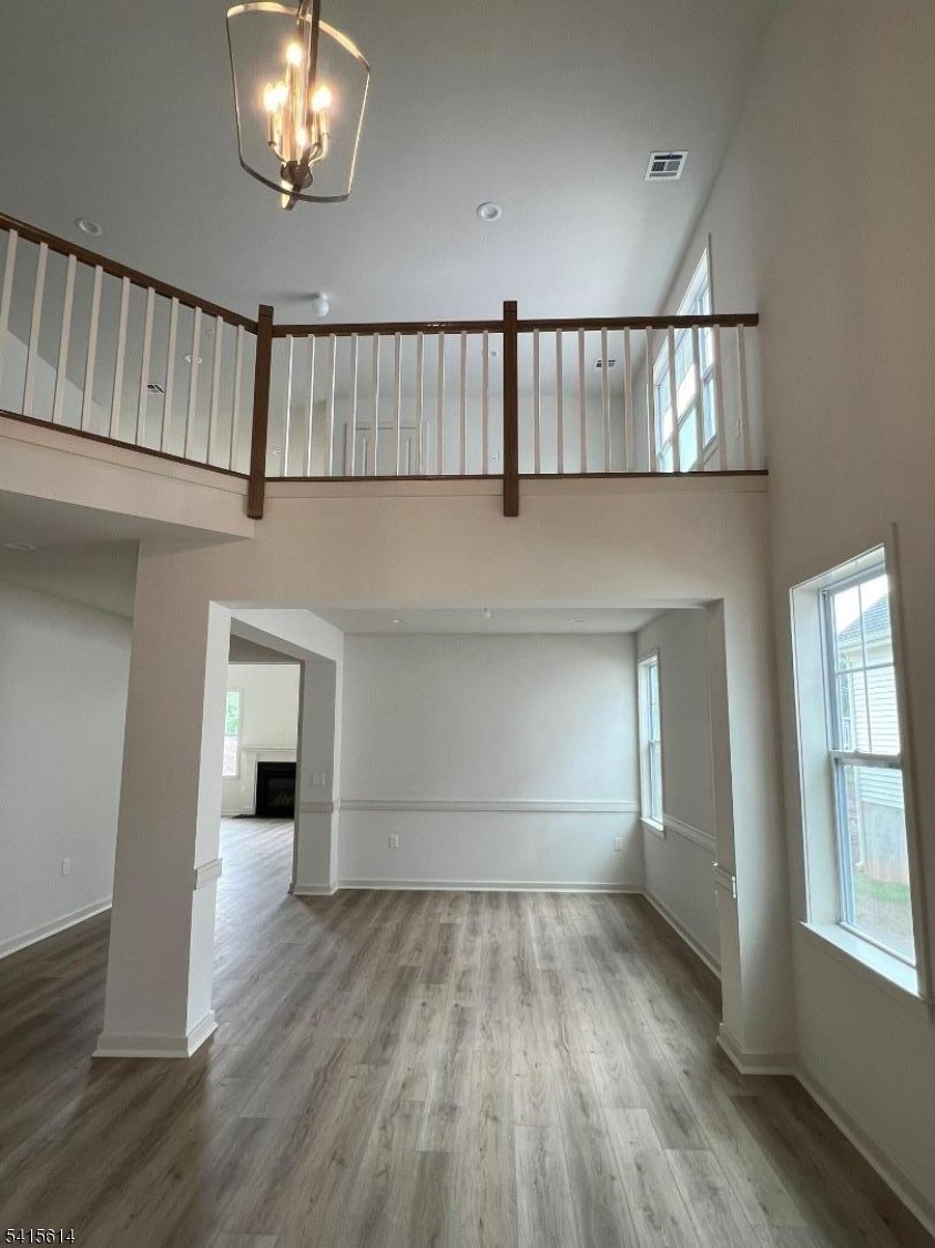 53 Norton Road Hillsborough, NJ 08844 - Photo 3 of 12 wooden floor in an empty room with a window