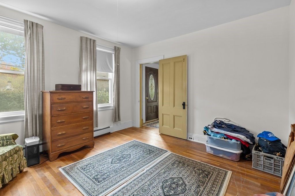 134 Bay State Road Rehoboth, MA 02769 - Photo 16 of 42 a bed room with a bed and a dresser