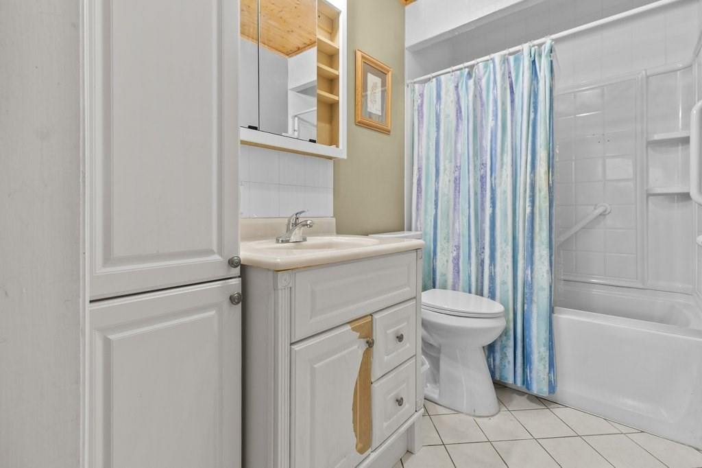 134 Bay State Road Rehoboth, MA 02769 - Photo 27 of 42 a bathroom with a sink toilet and shower