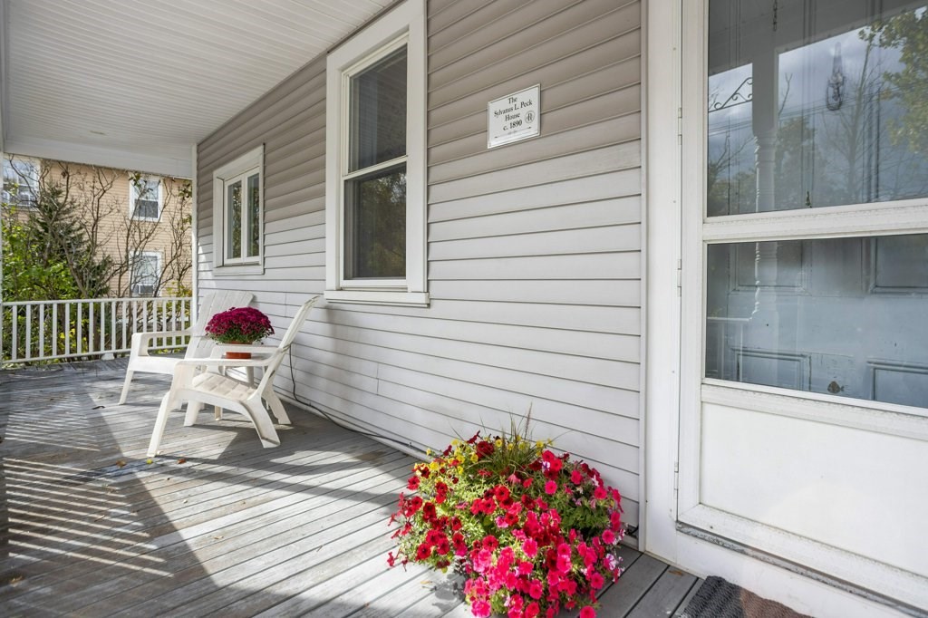 134 Bay State Road Rehoboth, MA 02769 - Photo 30 of 42 a white bench sitting in front of a house