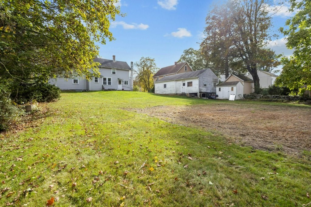 134 Bay State Road Rehoboth, MA 02769 - Photo 34 of 42 a front view of a house with a yard and trees