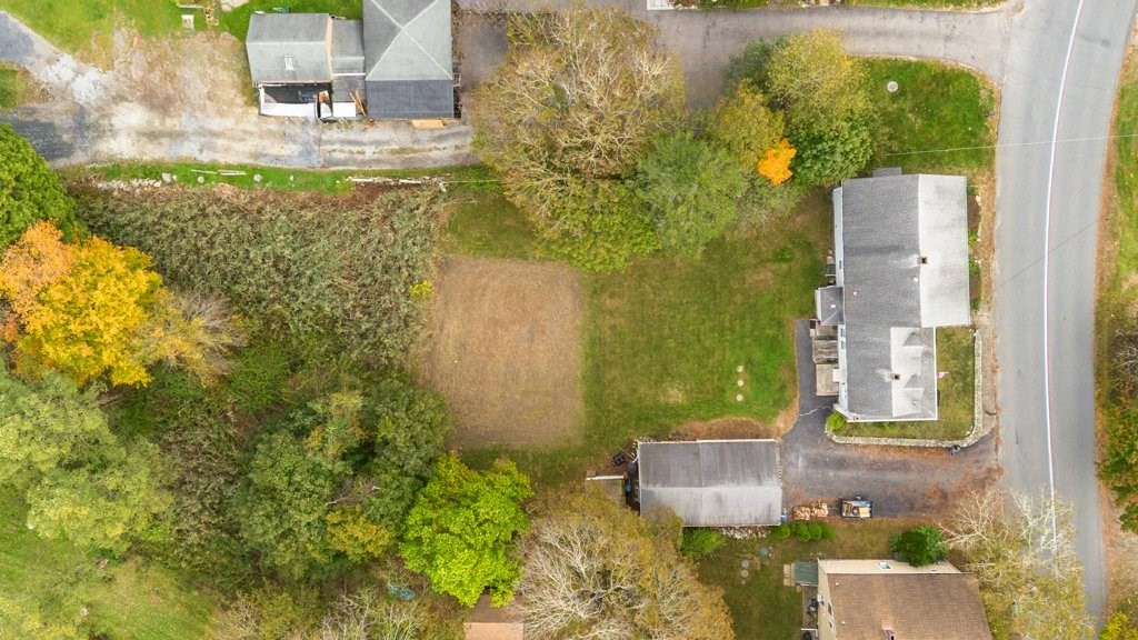 134 Bay State Road Rehoboth, MA 02769 - Photo 36 of 42 front view of a brick house with a yard