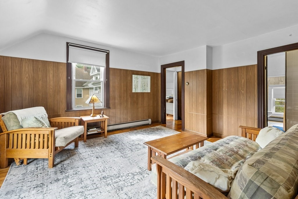 134 Bay State Road Rehoboth, MA 02769 - Photo 4 of 42 a bedroom with a bed and a couch