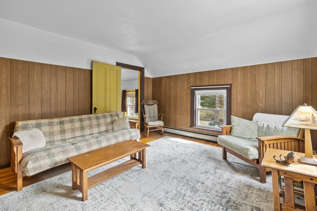 134 Bay State Road Rehoboth, MA 02769 - Photo 5 of 42 a living room with furniture and a potted plant