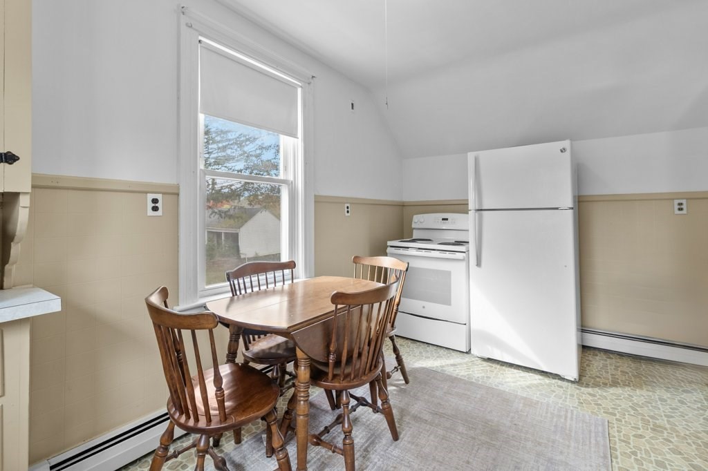 134 Bay State Road Rehoboth, MA 02769 - Photo 9 of 42 a dining room with furniture and a window