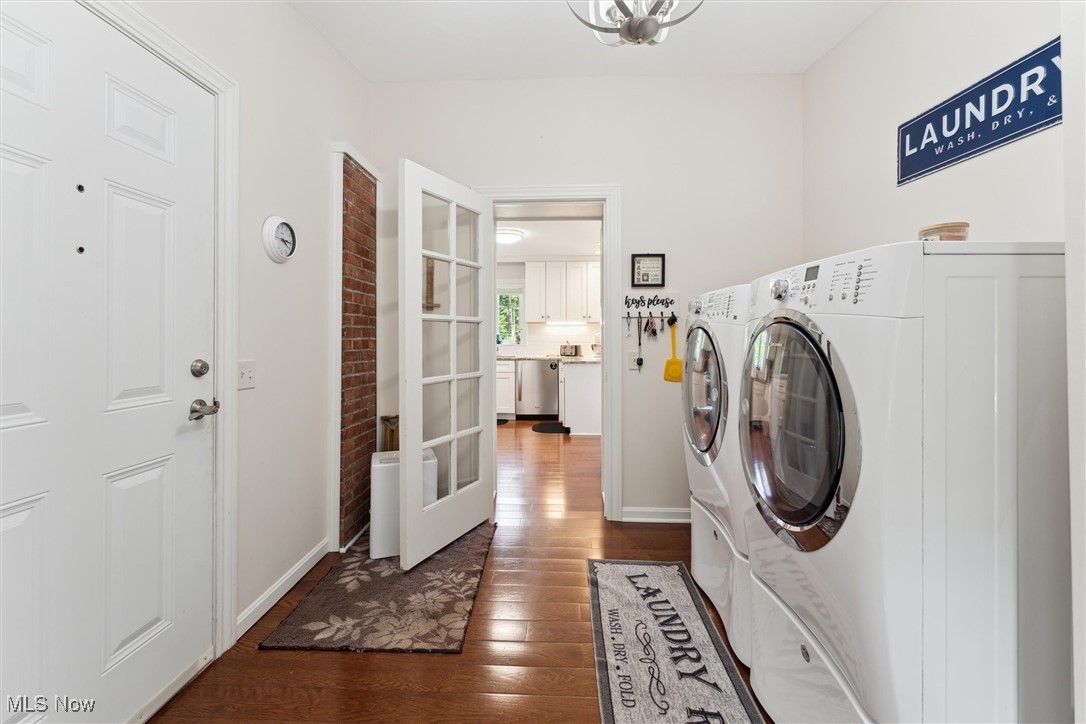 1059 Gulf Road Elyria, OH 44035 - Photo 46 of 50 Clothes washing area featuring dark hardwood / wood-style floors and washer and clothes dryer