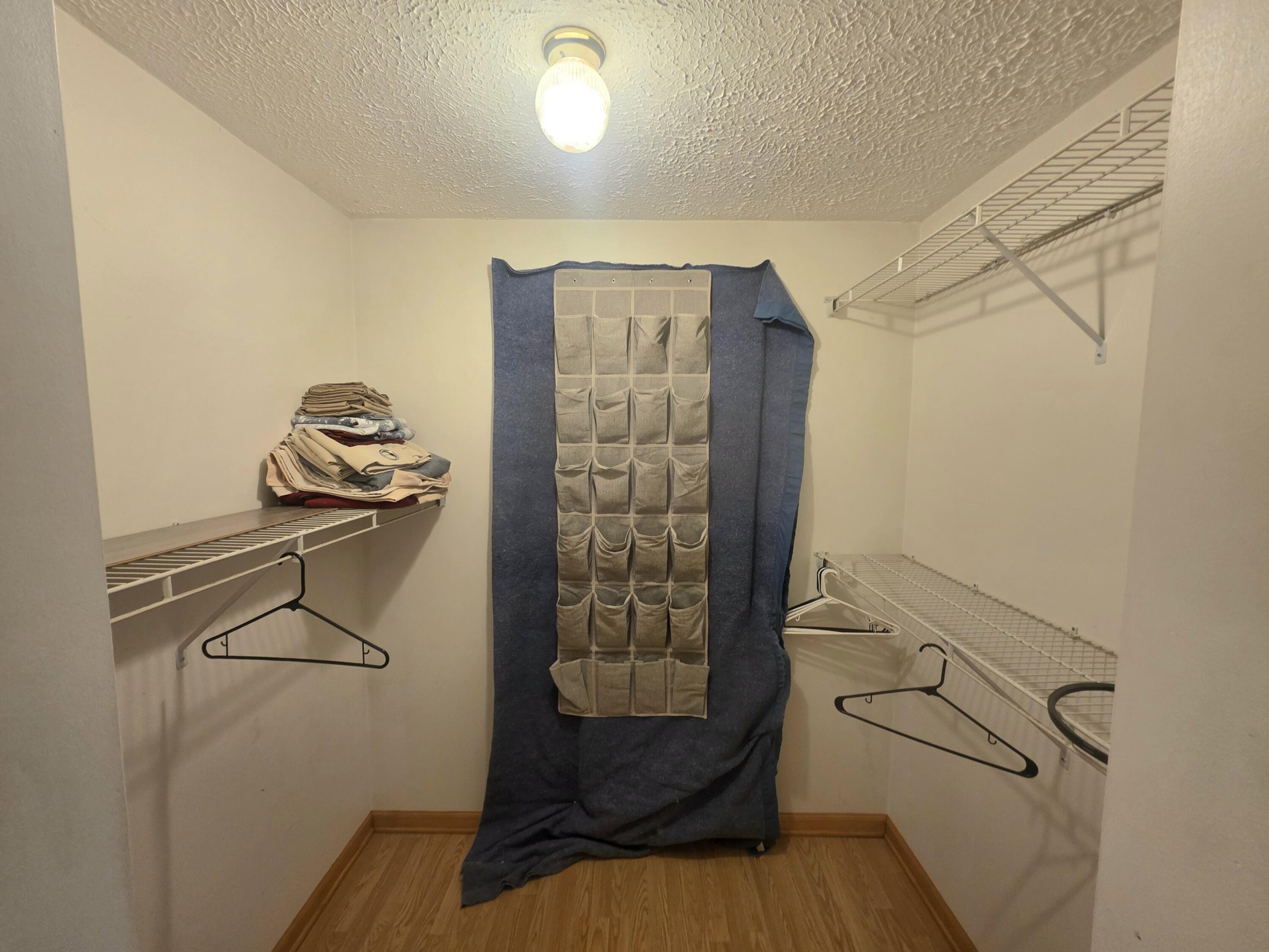 1402 Deaner Road Northeast Edmore, MI 48829 - Photo 16 of 17 Upper Walk-in Closet