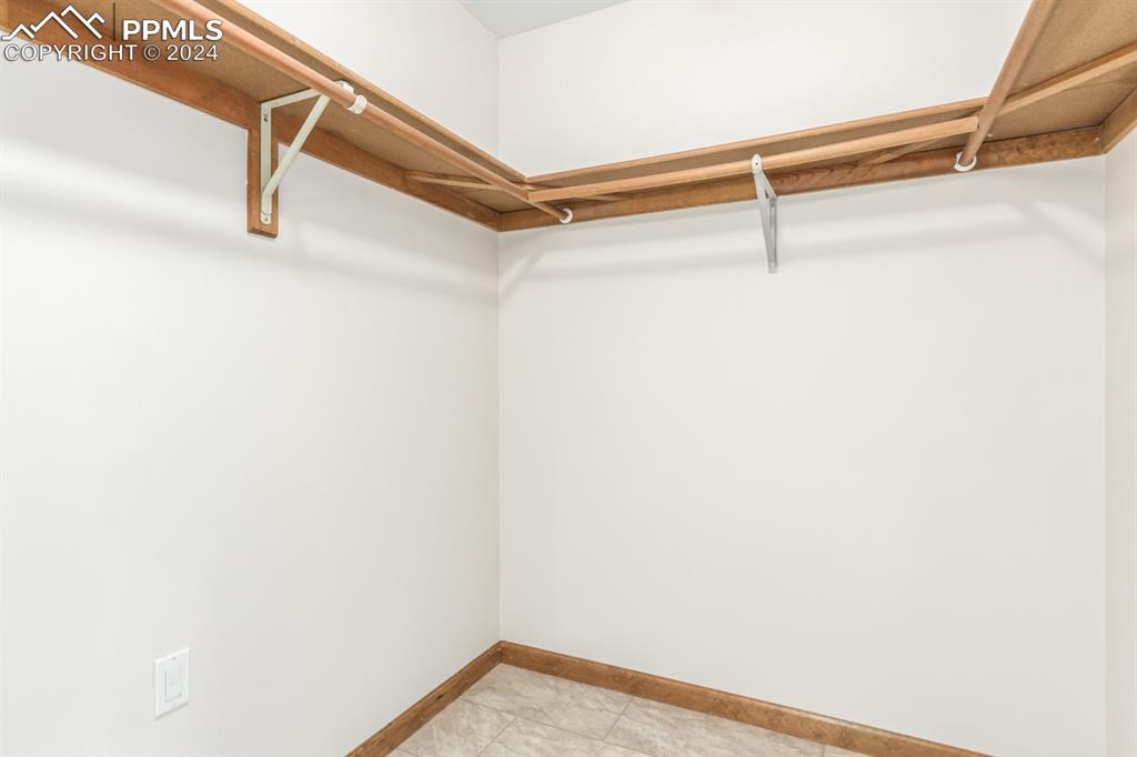 3955 Saddle Rock Road Colorado Springs, CO 80918 - Photo 26 of 45 a view of a room with racks on the wall
