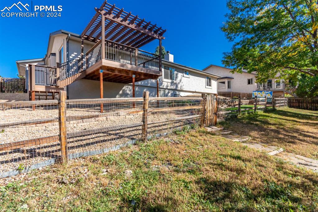 3955 Saddle Rock Road Colorado Springs, CO 80918 - Photo 42 of 45 front view of a house with a big yard