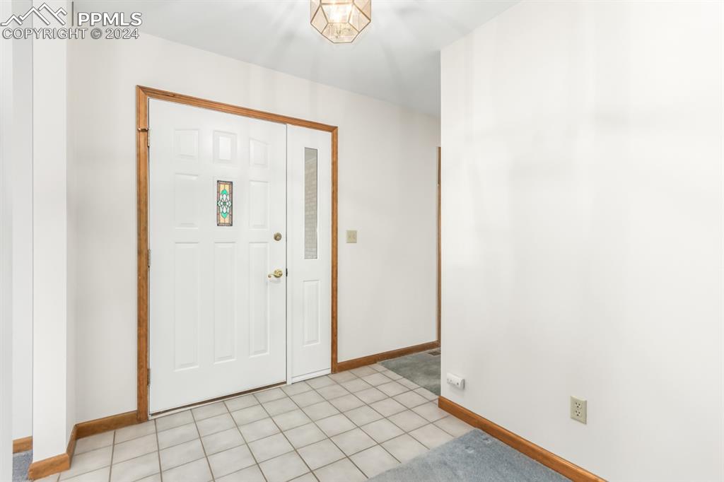 3955 Saddle Rock Road Colorado Springs, CO 80918 - Photo 6 of 45 a view of an empty room