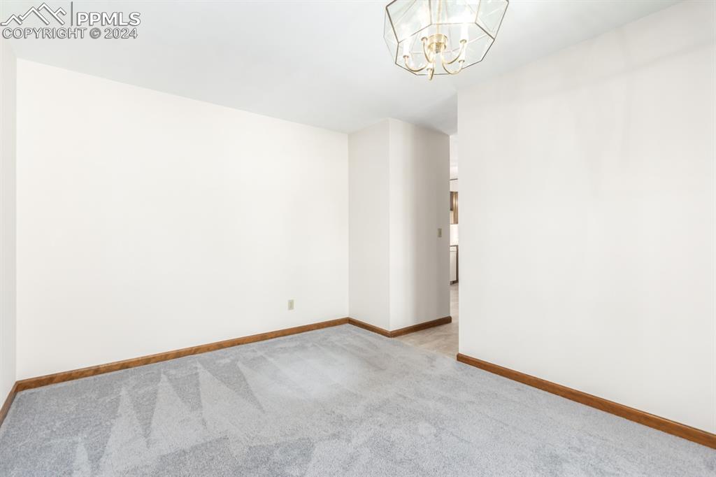 3955 Saddle Rock Road Colorado Springs, CO 80918 - Photo 9 of 45 a view of an empty room