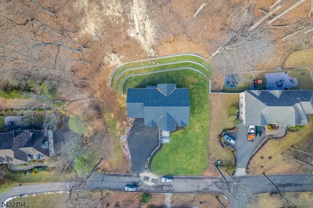 a view of a outdoor space with green field and trees