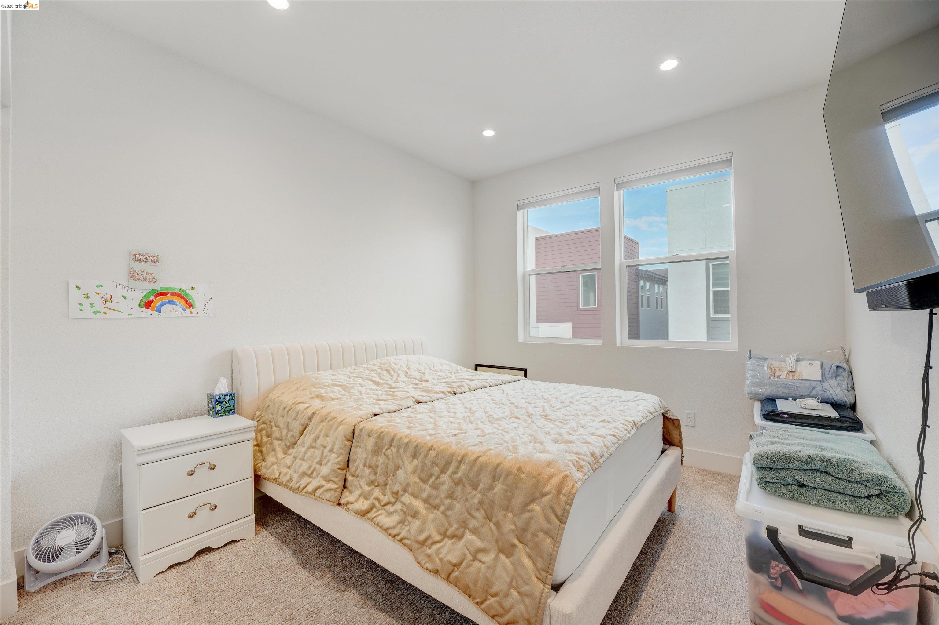 7101 Melon Court San Ramon, CA 94583 - Photo 37 of 58 a bedroom with a bed and a window
