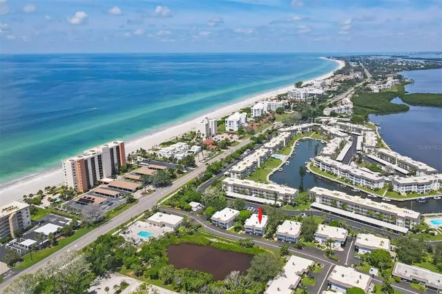 a view of a city with an ocean