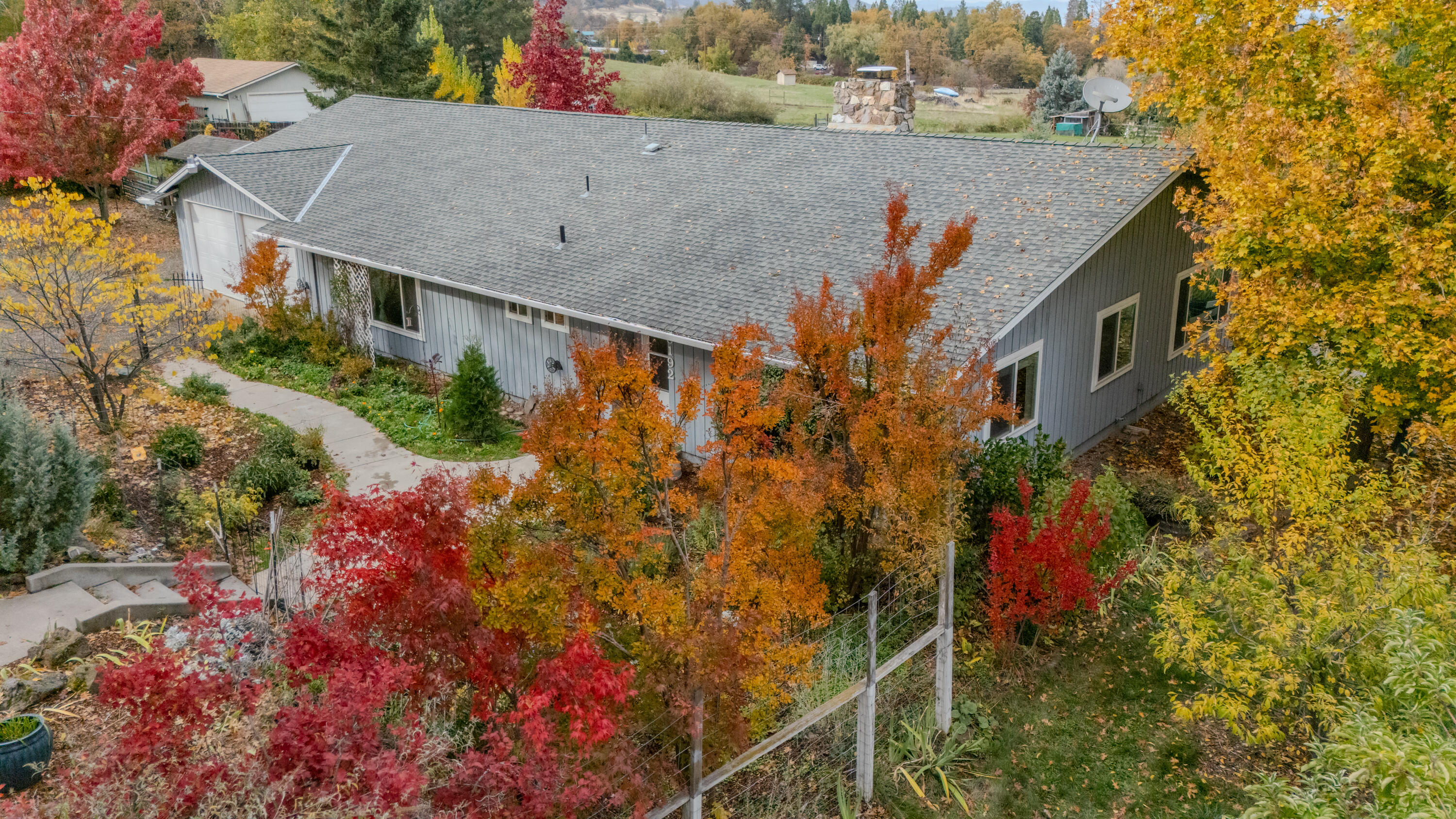 8192 Yank Gulch Road Talent, OR 97540 - Photo 4 of 34 an aerial view of house with a yard and potted plants