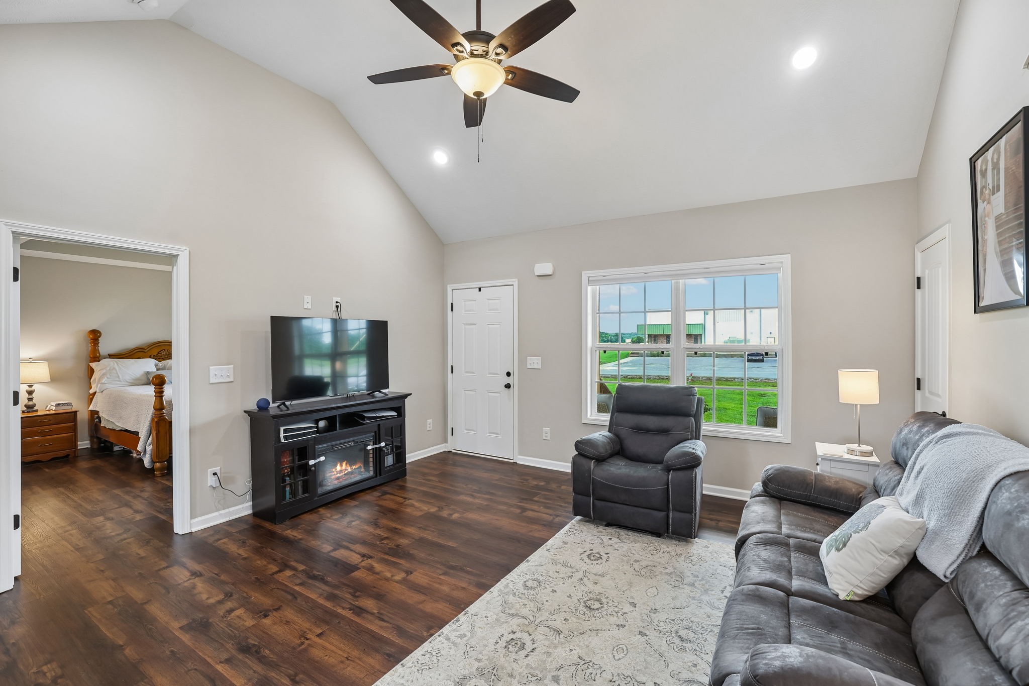1715 Old Belfast Road Lewisburg, TN 37091 - Photo 12 of 42 a living room with furniture and a flat screen tv