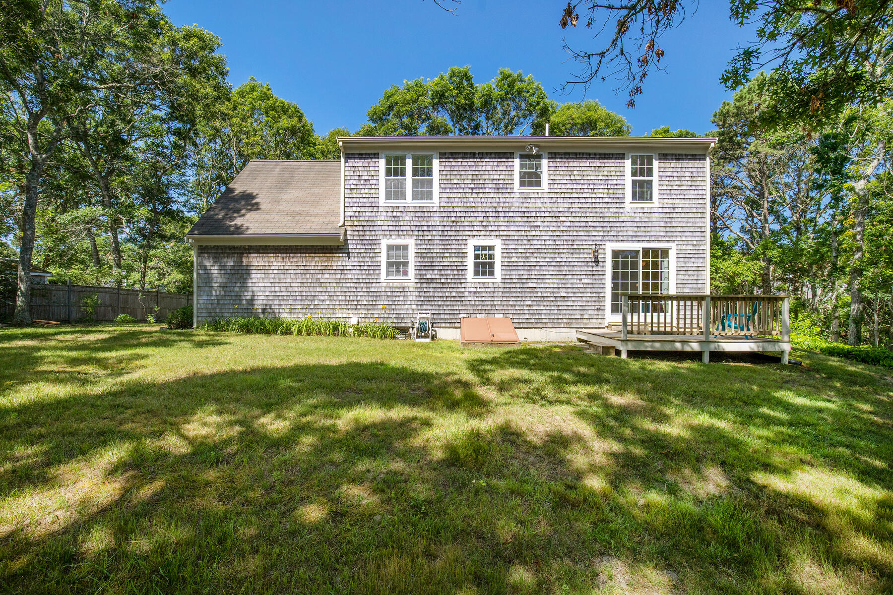 29 Carleton Drive Mashpee, MA 02649 - Photo 5 of 32 5 Back yard abutts conservation