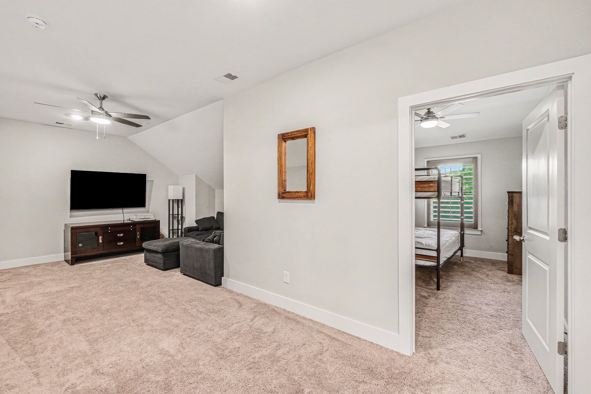 1144 Lock 4 Road, Unit H3 Gallatin, TN 37066 - Photo 20 of 22 a living room with furniture and a flat screen tv