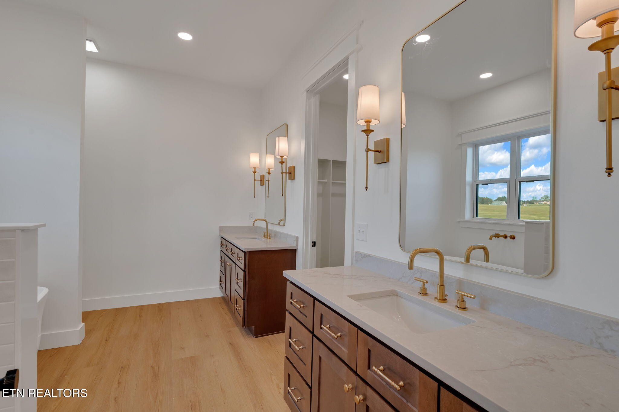 245 Pates Hill Road Mosheim, TN 37818 - Photo 13 of 35 a bathroom with a sink and a mirror
