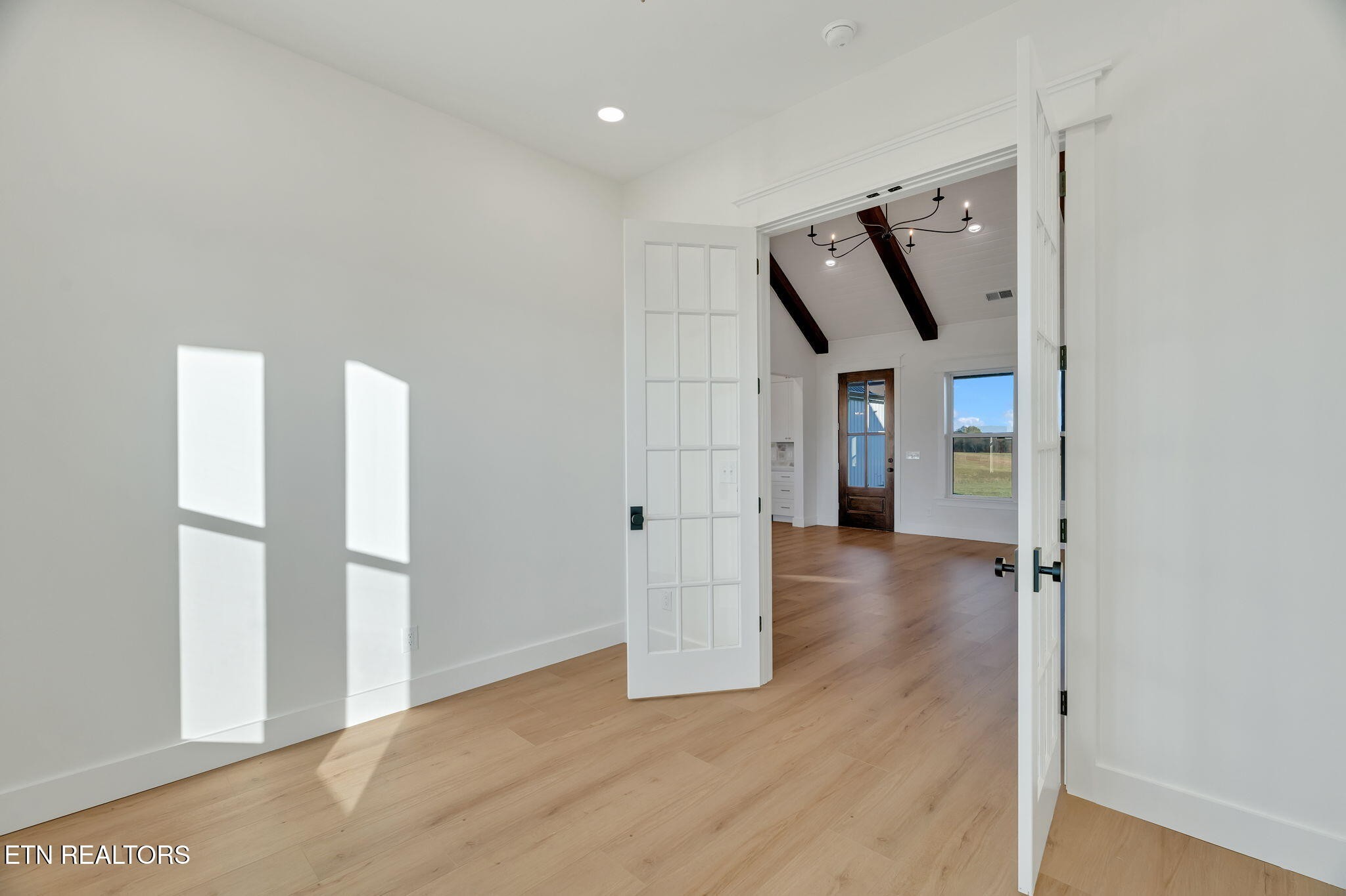 245 Pates Hill Road Mosheim, TN 37818 - Photo 18 of 35 a view of a hallway with wooden floor and entryway