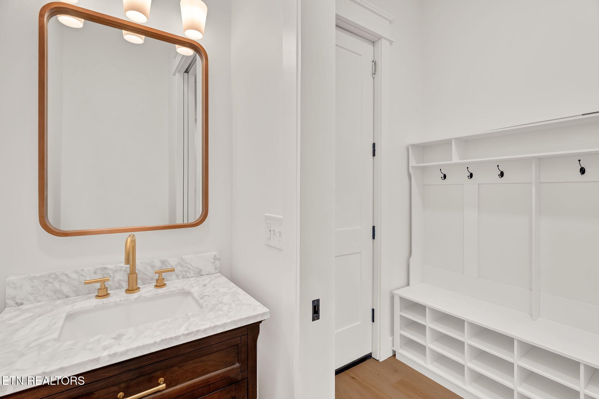 245 Pates Hill Road Mosheim, TN 37818 - Photo 21 of 35 a bathroom with a sink and a mirror