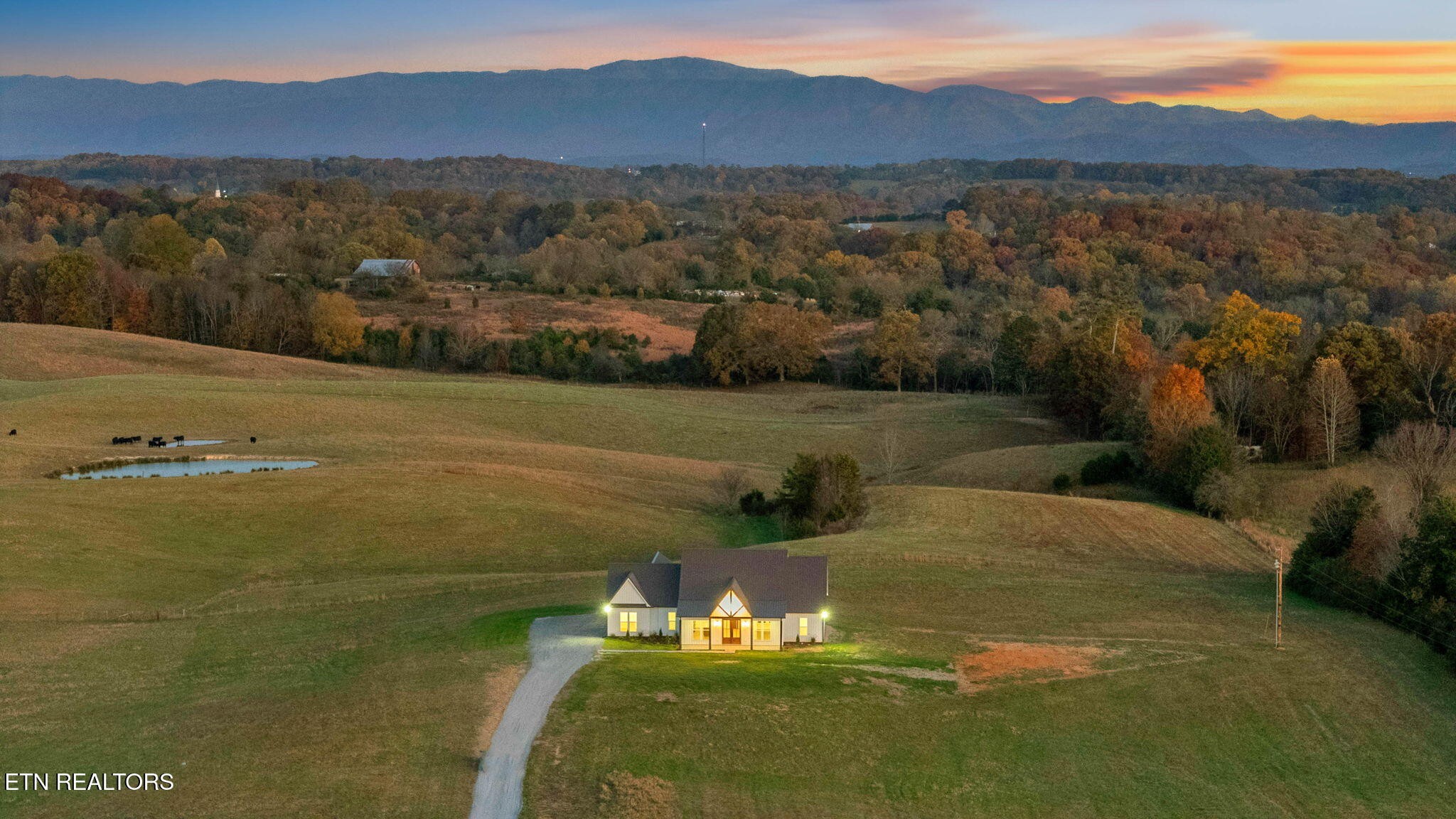 245 Pates Hill Road Mosheim, TN 37818 - Photo 31 of 35 a view of a lake with a mountain