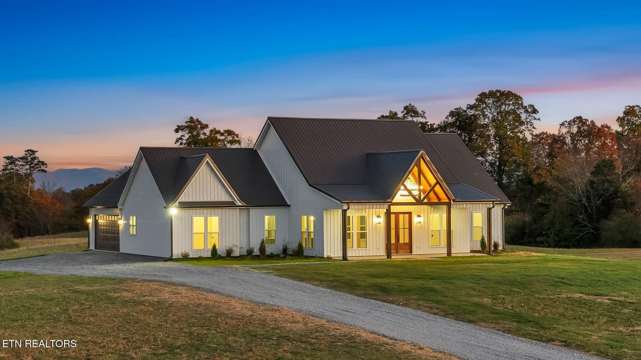 245 Pates Hill Road Mosheim, TN 37818 - Photo 33 of 35 a front view of a house with a garden