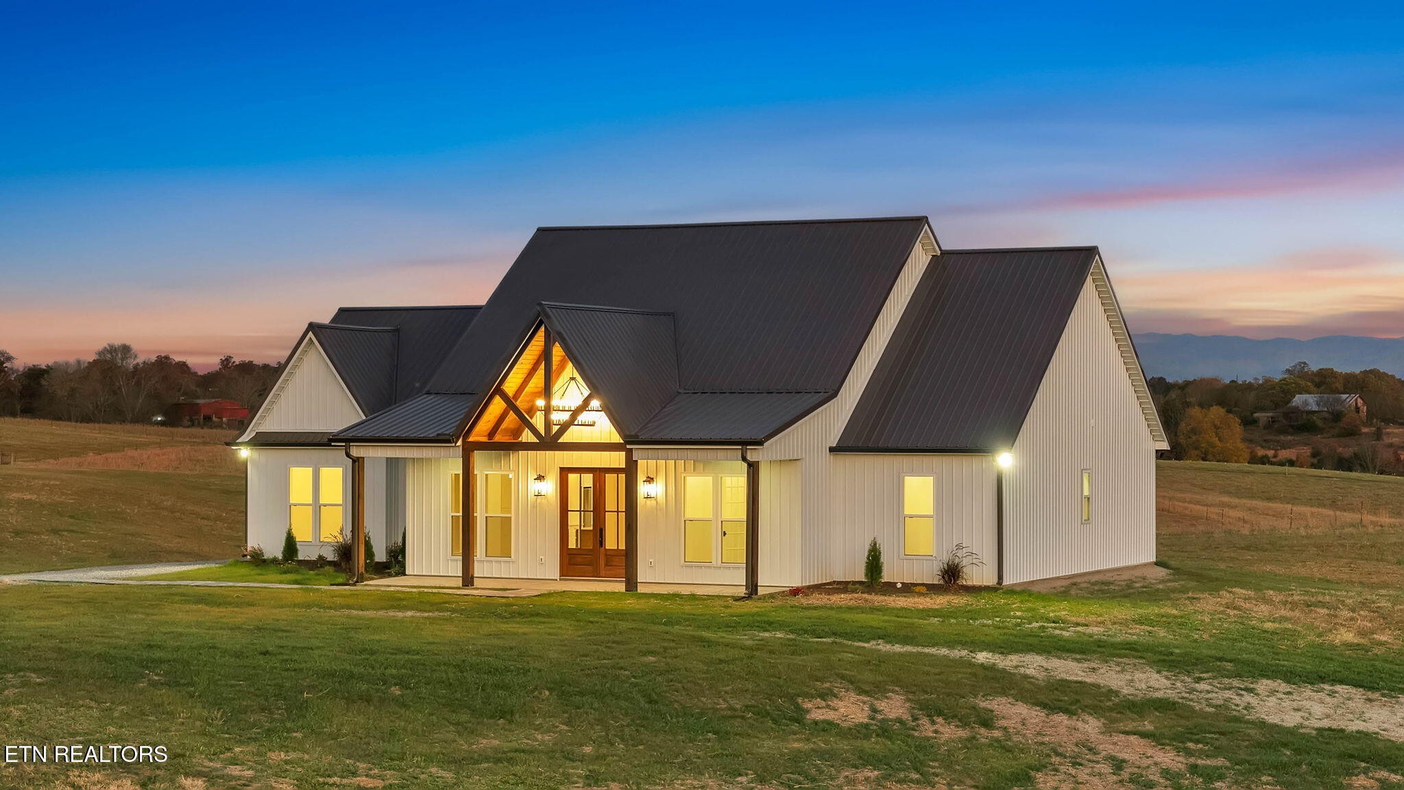 245 Pates Hill Road Mosheim, TN 37818 - Photo 34 of 35 a big room with an outdoor space and seating area