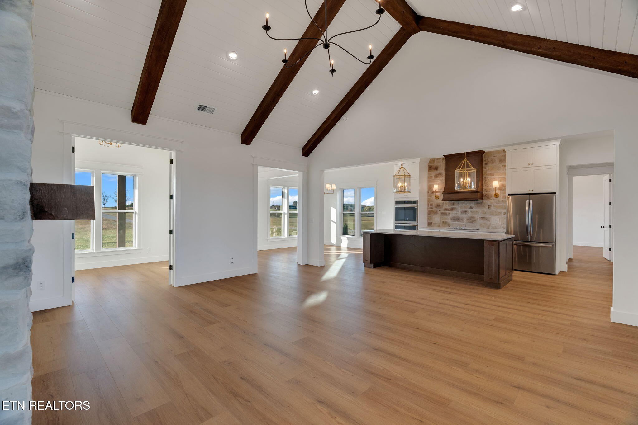 245 Pates Hill Road Mosheim, TN 37818 - Photo 4 of 35 a view of a kitchen with a sink and a large window