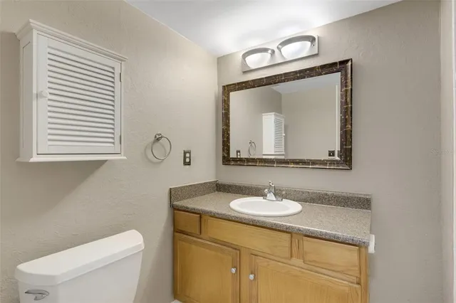 an empty room with a empty space and windows