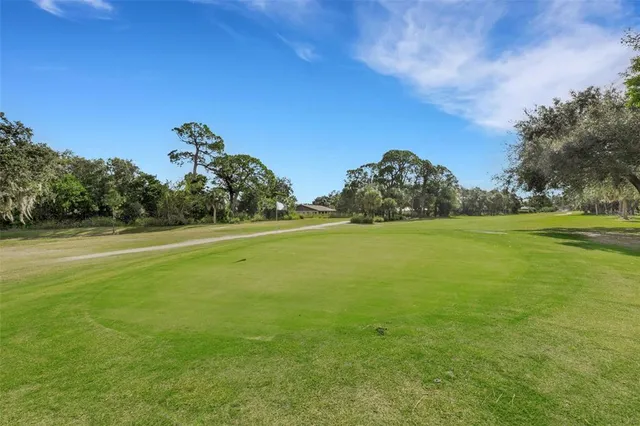 a house with swimming pool in front of it