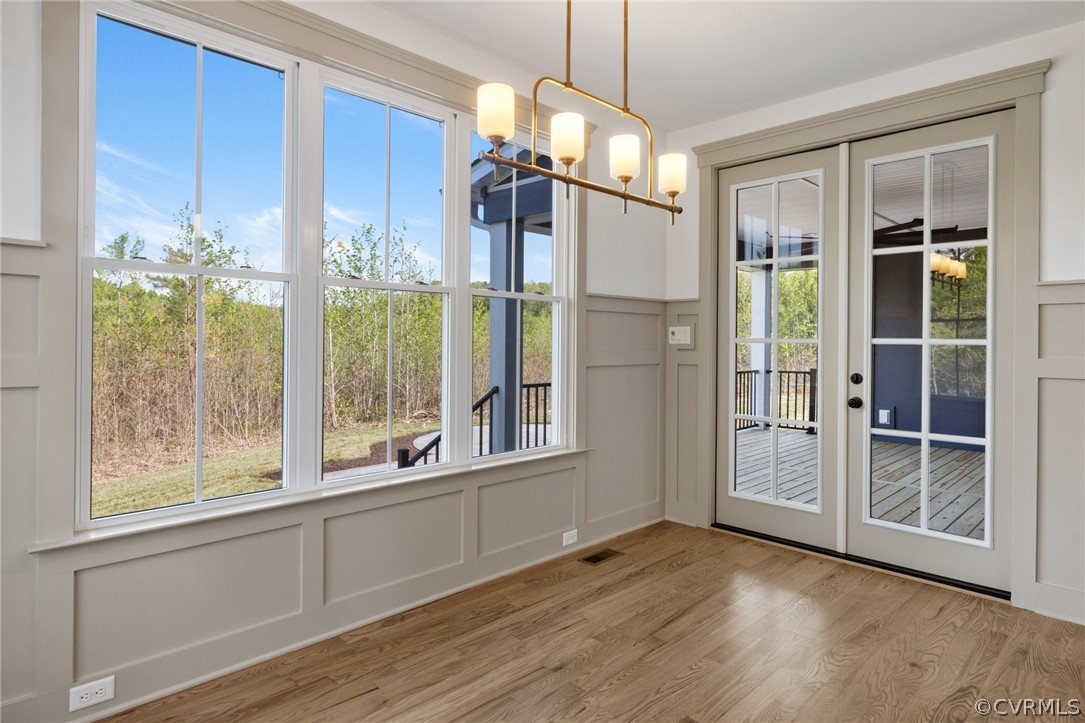 3501 Heaton Drive Midlothian, VA 23112 - Photo 20 of 41 a view of an empty room with a window and wooden floor