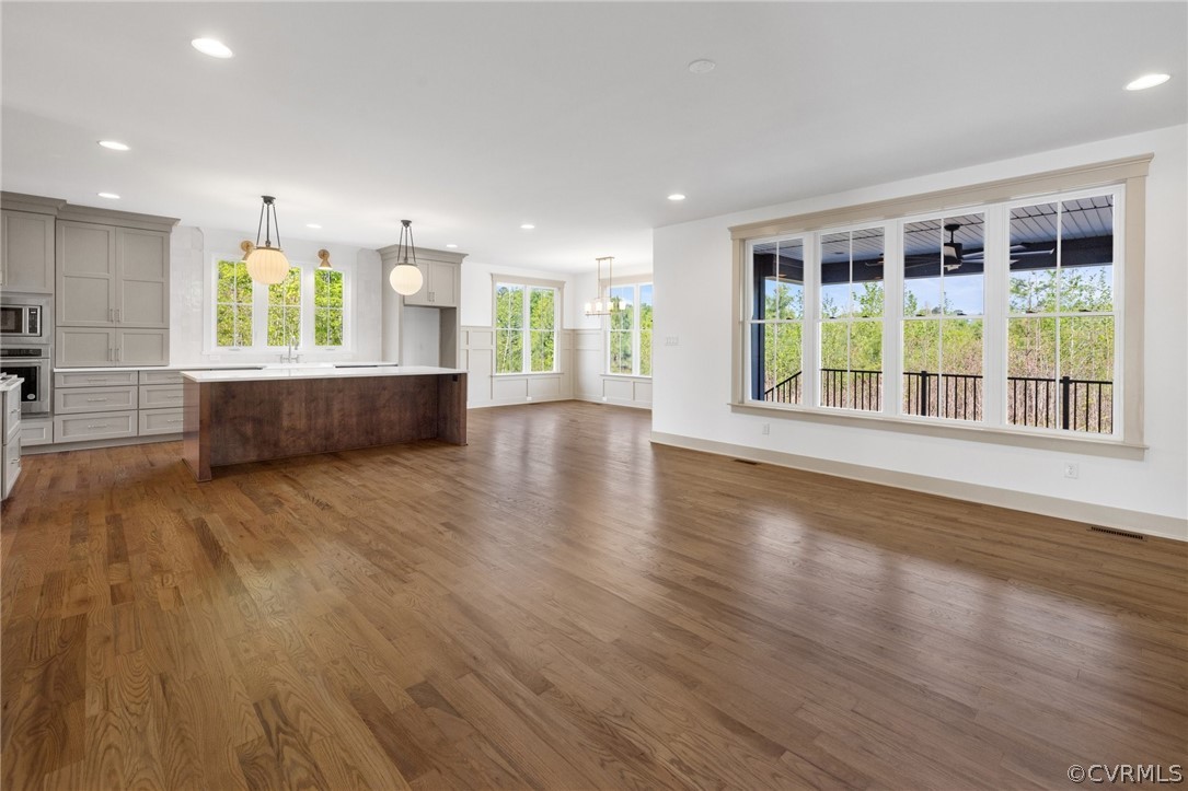 3501 Heaton Drive Midlothian, VA 23112 - Photo 22 of 41 an empty room with wooden floor and windows
