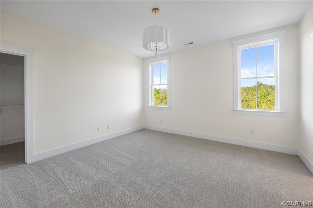 3501 Heaton Drive Midlothian, VA 23112 - Photo 37 of 41 an empty room with windows and closet