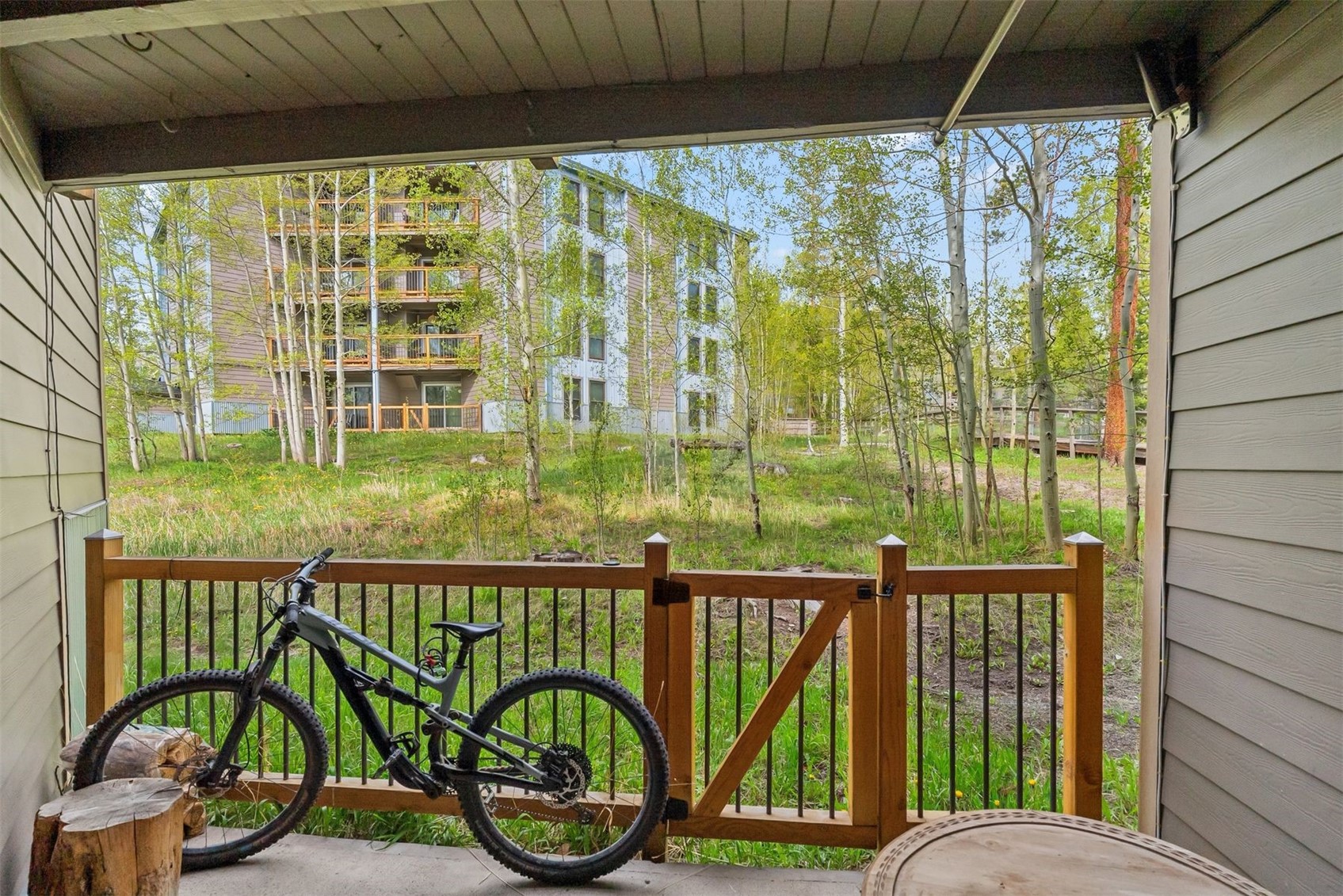 8100 Ryan Gulch Road, Unit 106 Wildernest, CO 80498 - Photo 25 of 43 a view of a two chairs in the balcony