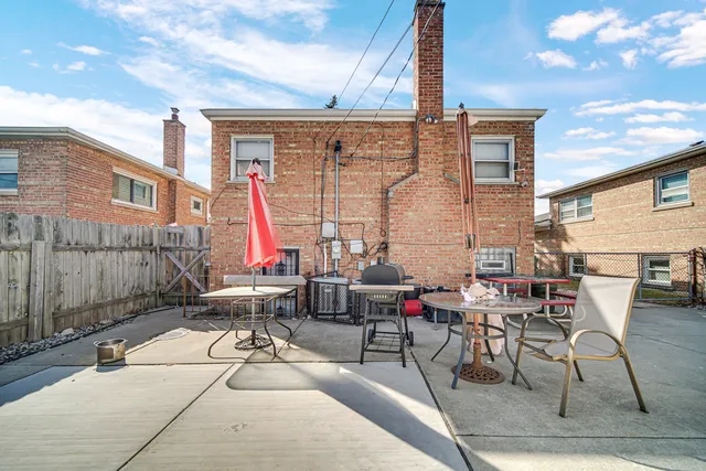 a building outdoor space with patio furniture