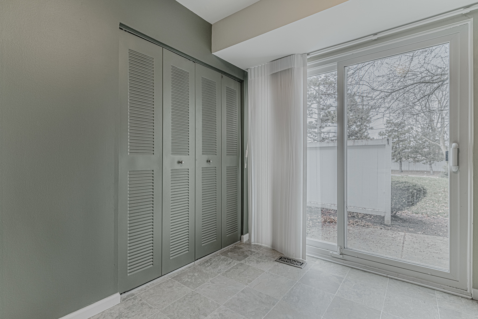 1516 Normantown Road Naperville, IL 60564 - Photo 8 of 20 an empty room with a outdoor space