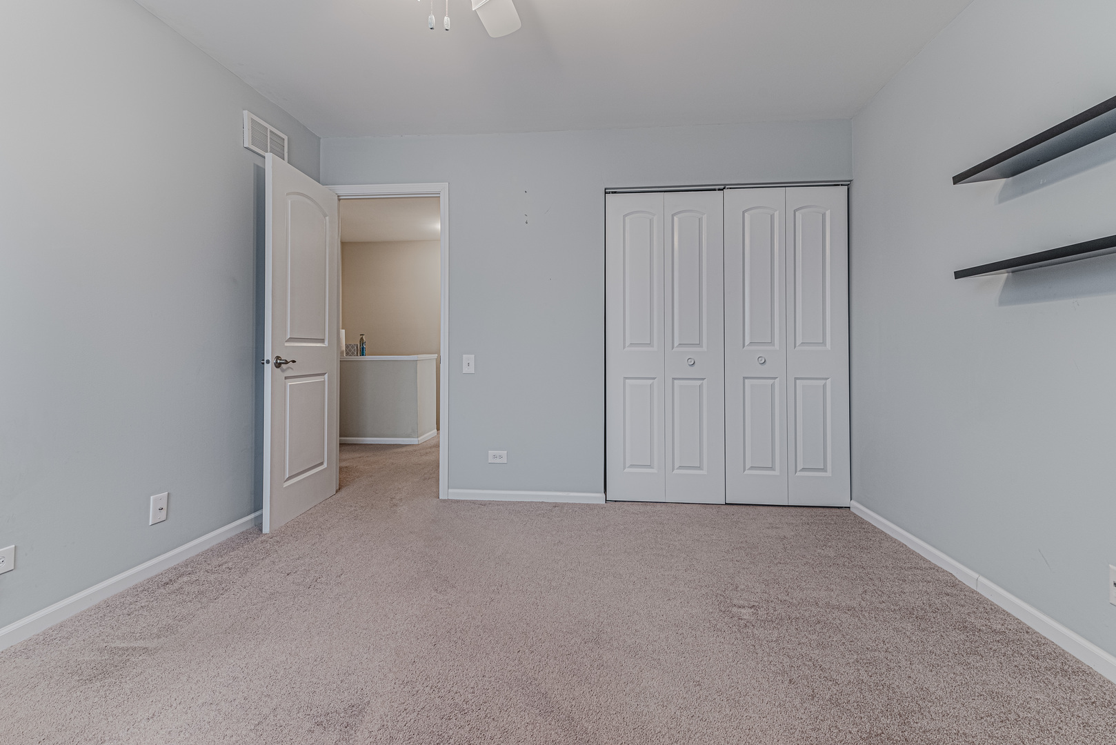 1516 Normantown Road Naperville, IL 60564 - Photo 10 of 20 a view of an empty room and closet area