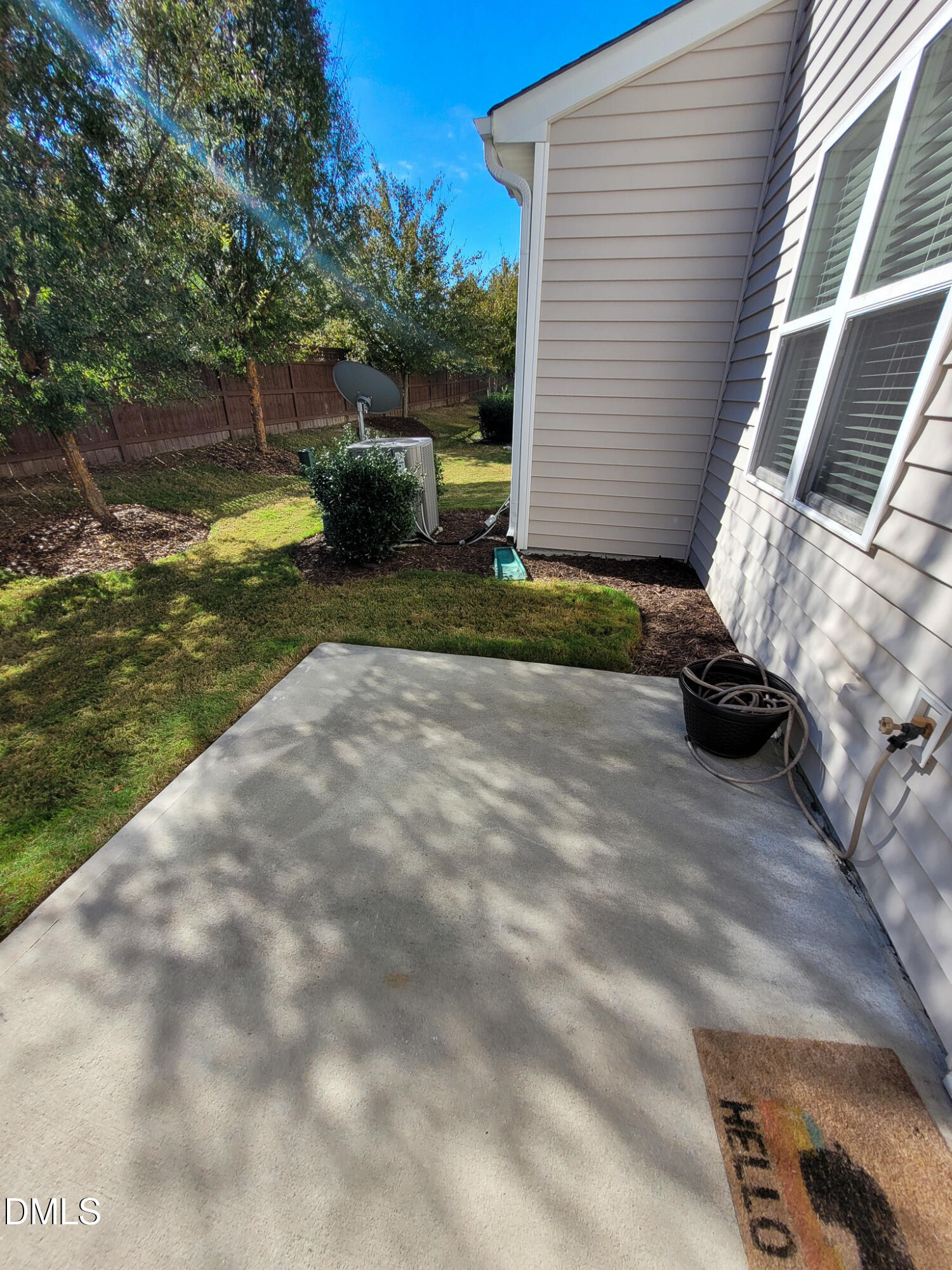 8951 Commons Townes Drive Raleigh, NC 27616 - Photo 39 of 40 a view of a backyard with chair and entertaining space