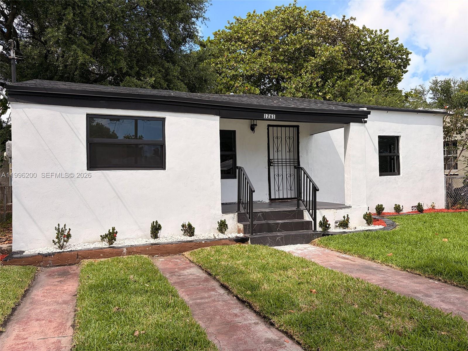 1261 Northwest 45th Street Miami, FL 33142 - Photo 1 of 77