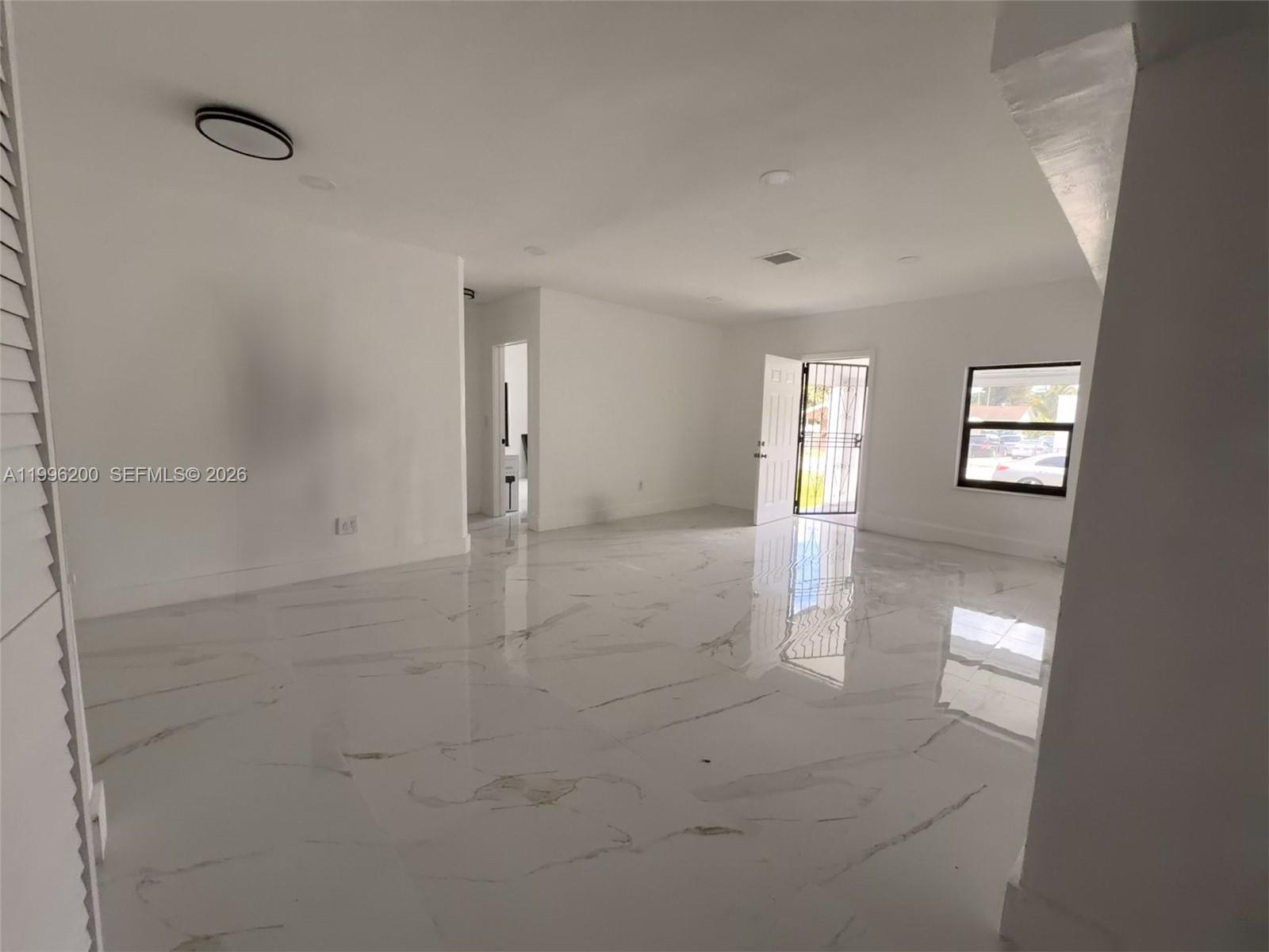 1261 Northwest 45th Street Miami, FL 33142 - Photo 32 of 95 a view of an empty room