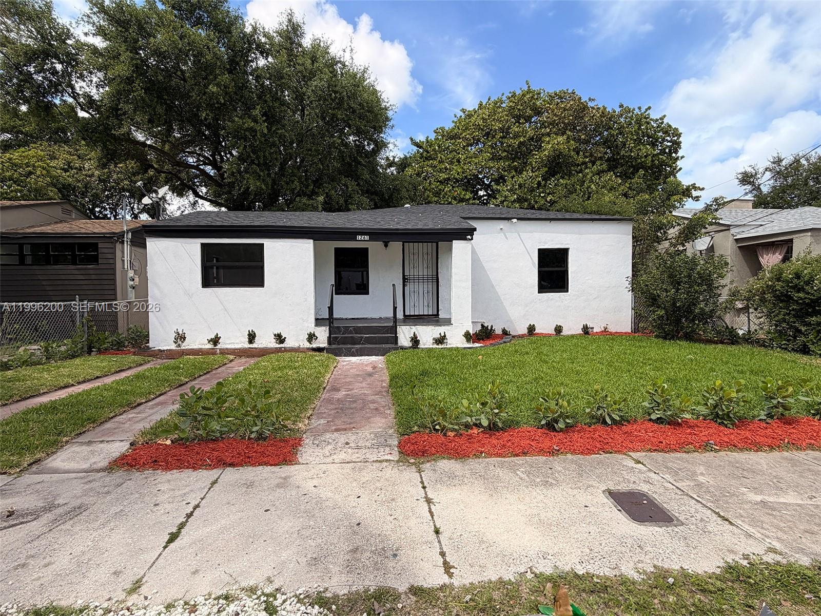 1261 Northwest 45th Street Miami, FL 33142 - Photo 4 of 77