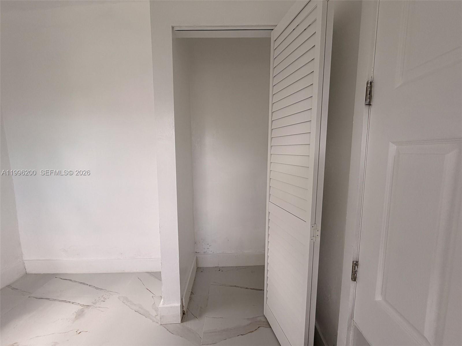 1261 Northwest 45th Street Miami, FL 33142 - Photo 78 of 95 a view of a hallway