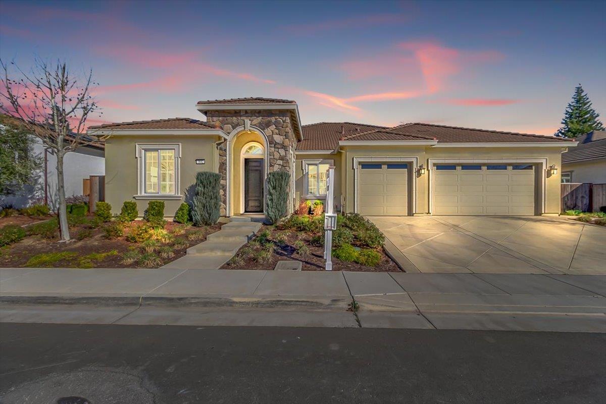 7842 Cinnamon Way Gilroy, CA 95020 - Photo 1 of 51 a front view of a house with a yard