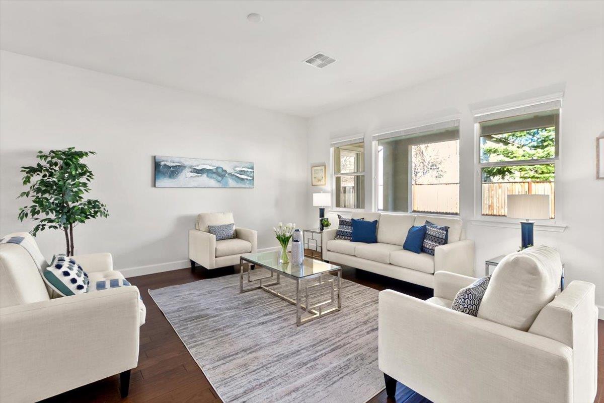7842 Cinnamon Way Gilroy, CA 95020 - Photo 21 of 51 a living room with furniture and a large window