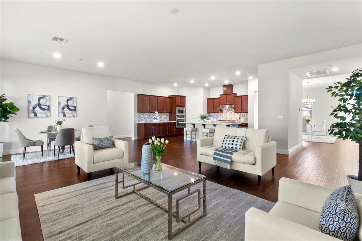 7842 Cinnamon Way Gilroy, CA 95020 - Photo 22 of 51 a living room with furniture and kitchen view
