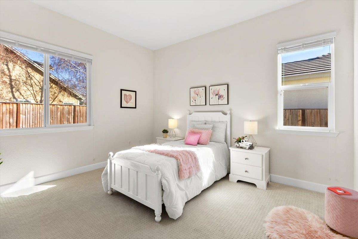 7842 Cinnamon Way Gilroy, CA 95020 - Photo 29 of 51 a bedroom with a bed and a window
