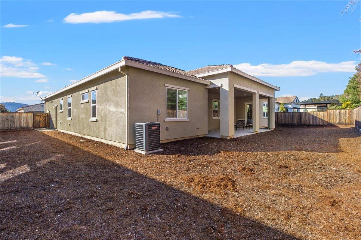 7842 Cinnamon Way Gilroy, CA 95020 - Photo 36 of 51 a view of a house with a yard