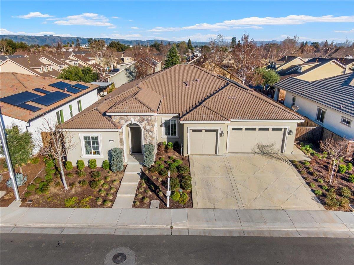 7842 Cinnamon Way Gilroy, CA 95020 - Photo 38 of 51 an aerial view of a house with a yard and ocean view